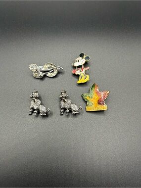 Lot of small pins and brooches , poodle , Mickey Mouse , Canadian leaf